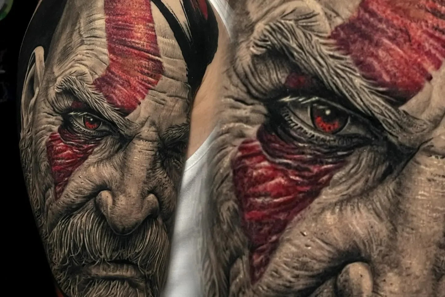 Tatuaje realista de un personaje con barba y marcas rojas en el rostro, mostrando un intenso detalle en los ojos y la expresión facial.